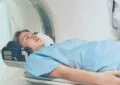 a woman getting MRI scanned