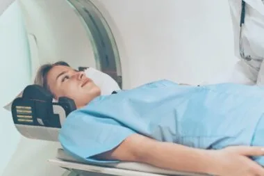 a woman getting MRI scanned